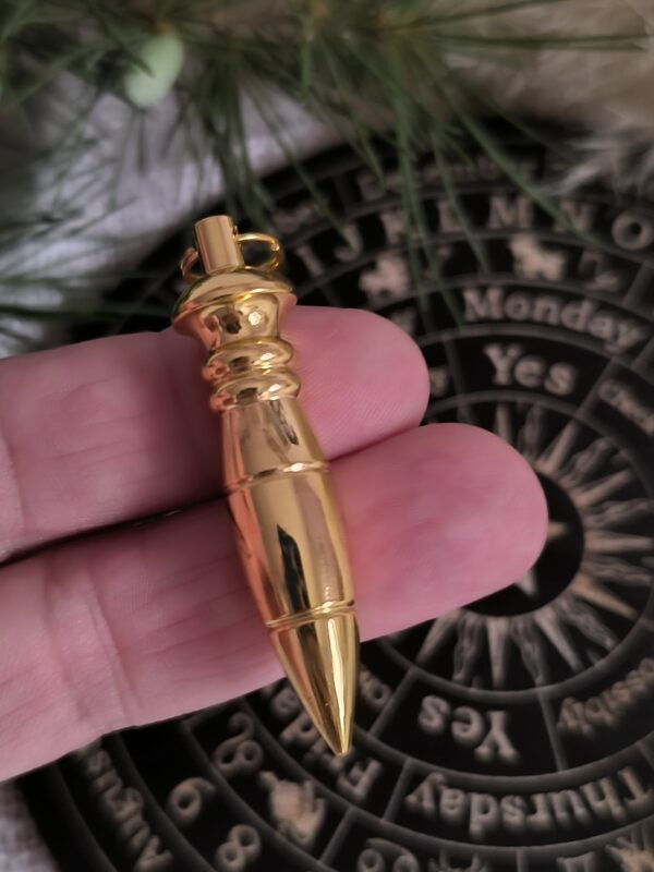 IMG_20251030_171452 Péndulo Karnak Dorado – Energía y Precisión Mística