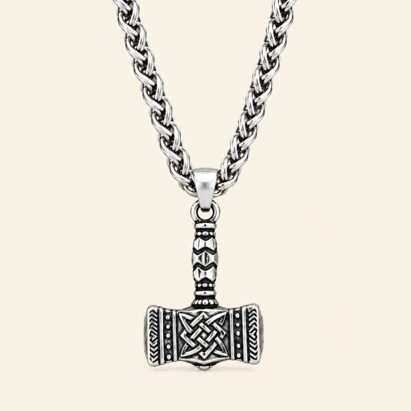 Colgante Mjolnir de Thor con Nudo Celta Colgante Mjolnir de Thor con nudo celta en acero inoxidable 316L